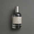 2005 de Elixir Amador: frasco cilíndrico de 120 ml sobre fondo gris.