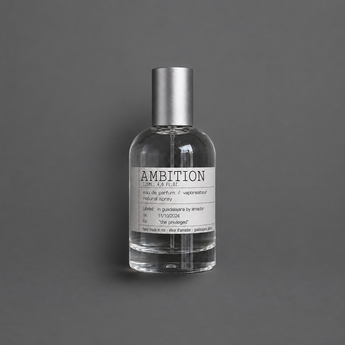 Ambition de Elixir Amador: frasco cilíndrico de 120 ml sobre fondo gris.