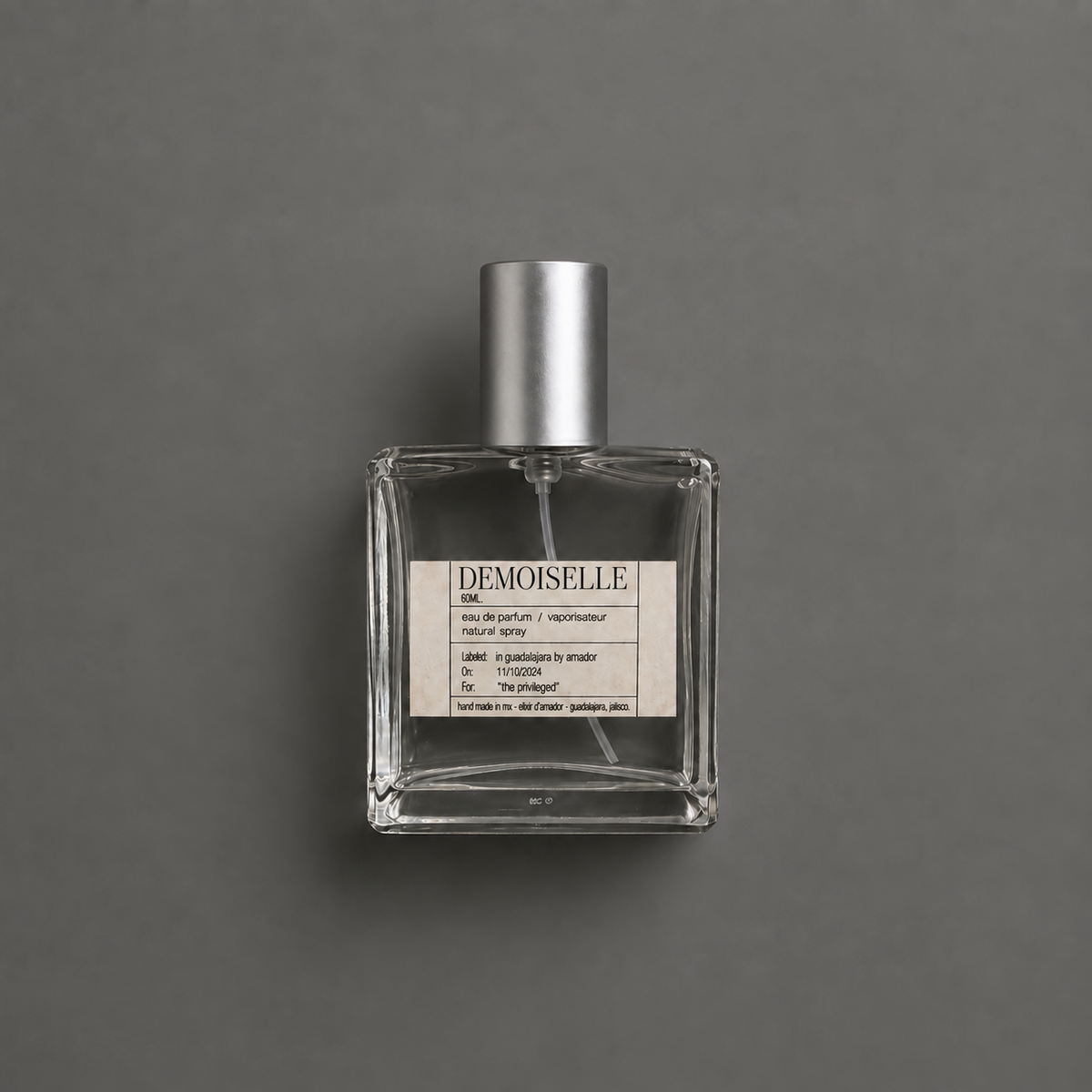 Demoiselle de Elixir Amador: frasco cuadrado de 60 ml.