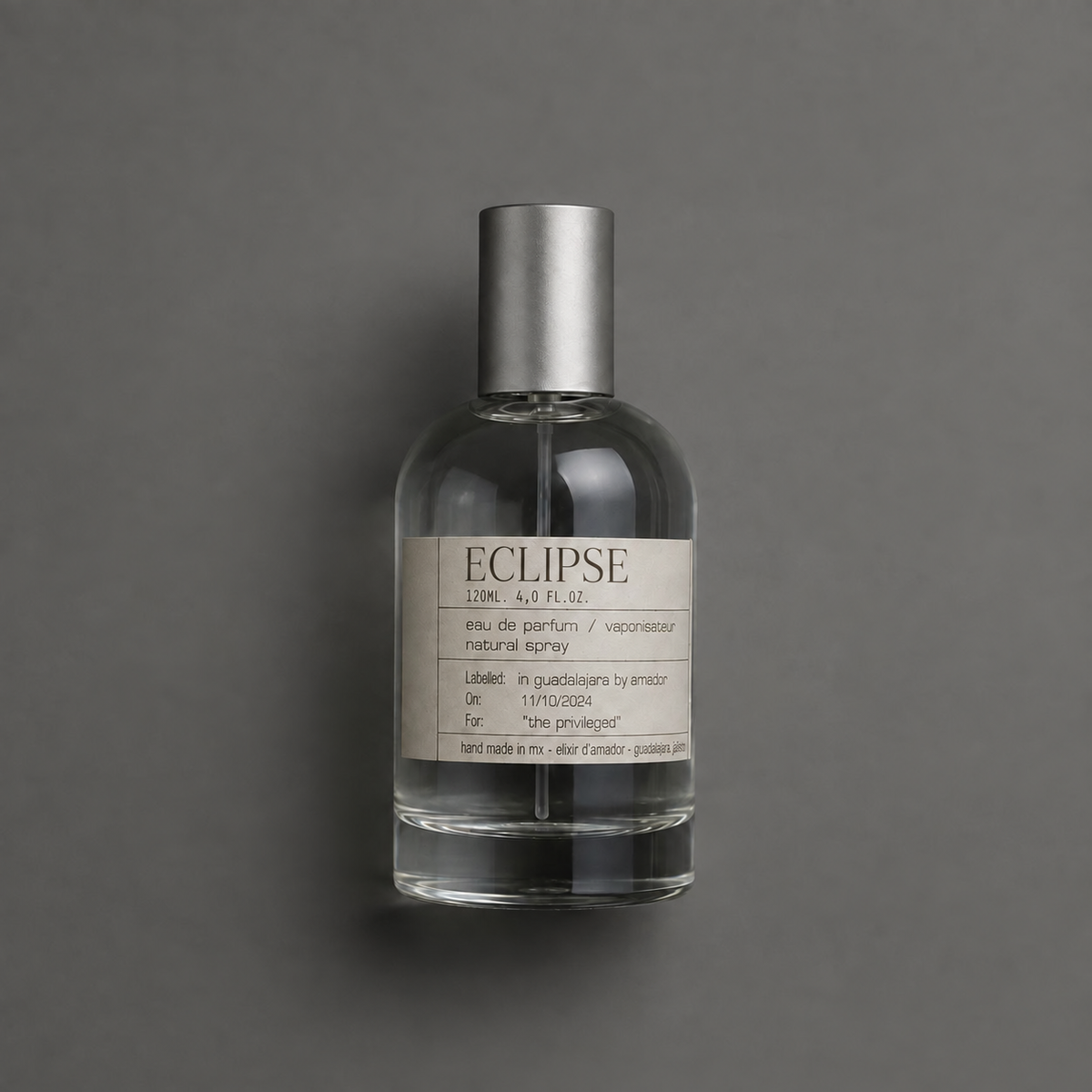 Eclipse de Elixir Amador: frasco cilíndrico de 120 ml sobre fondo gris.