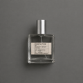 Éden Pur de Elixir Amador: frasco cuadrado de 60 ml sobre fondo gris.