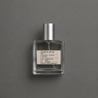 Éden Pur de Elixir Amador: frasco cuadrado de 60 ml sobre fondo gris.
