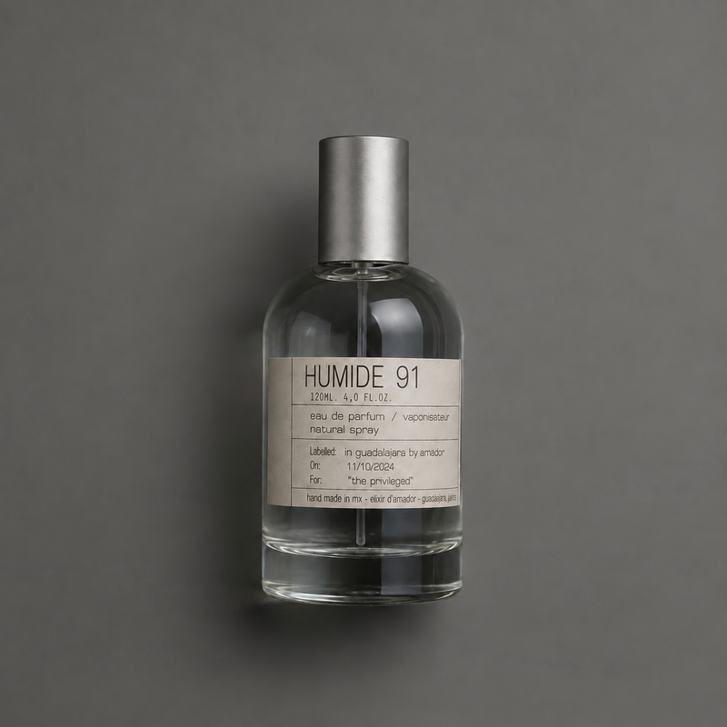 Humide 91 de Elixir Amador: frasco cilíndrico de 120 ml sobre fondo gris.