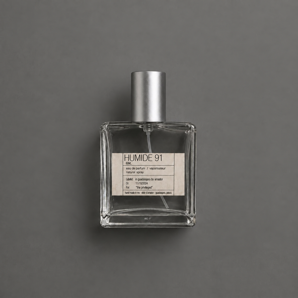 Humide 91 de Elixir Amador: frasco cuadrado de 60 ml sobre fondo gris.