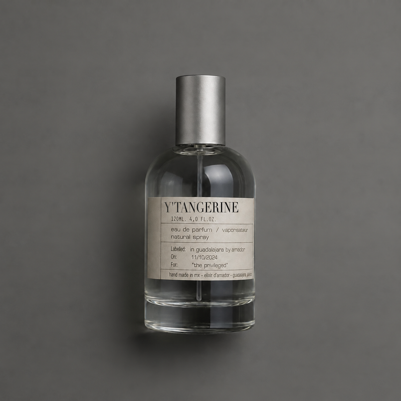 Y’ Tangerine de Elixir Amador: frasco cilíndrico de 120 ml sobre fondo gris.