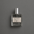 Y’ Tangerine de Elixir Amador: frasco cuadrado de 60 ml sobre fondo gris.